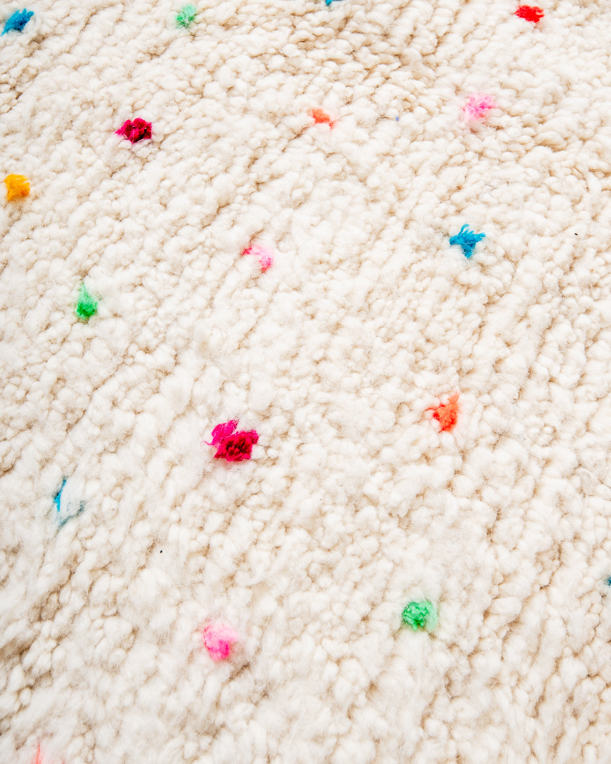 Modern, designer, handcrafted Berber rug from Morocco. Beniourain carpet with beautiful colours and patterns and fluffy wool texture.